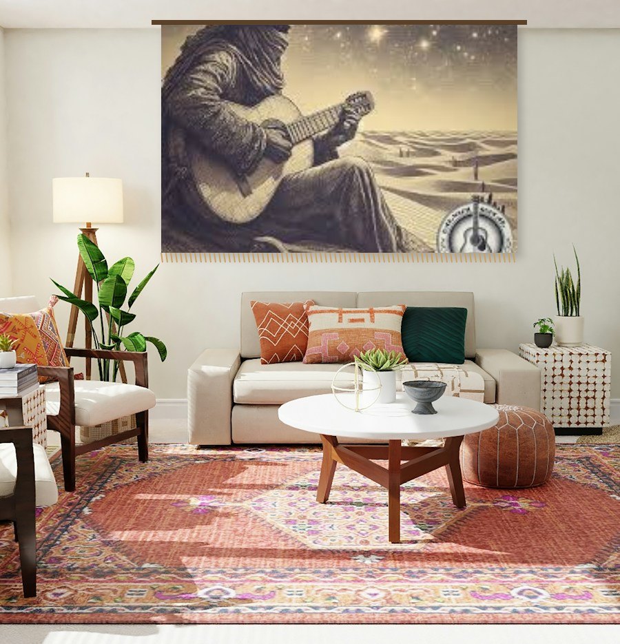 Desert Night tapestry hanging above a sofa in a living room