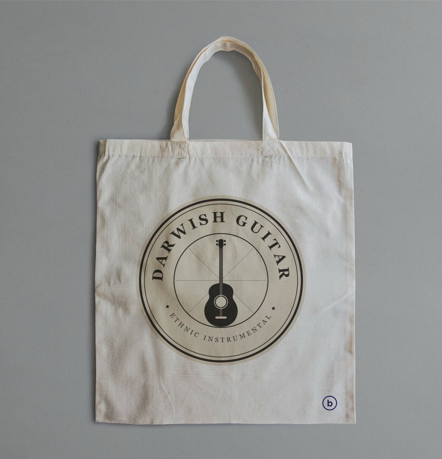 Natural canvas tote bag with the Darwish Guitar emblem
